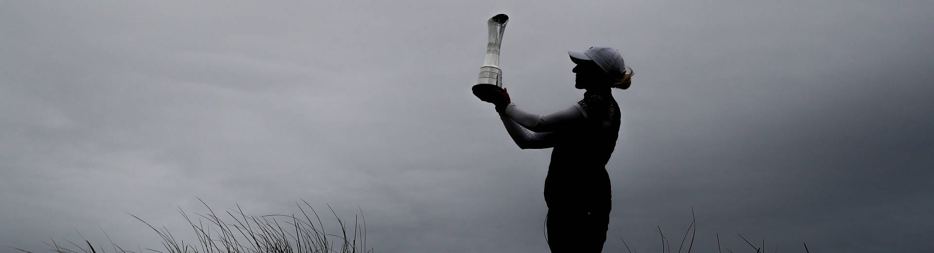 Sophia Popov holding the AIG Women's Open Trophy